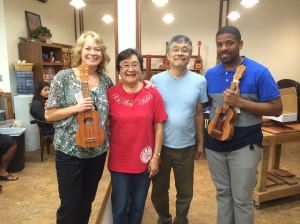 Posing with "Moms" Pat and "Pops" Alvin Okami with new ukuleles!